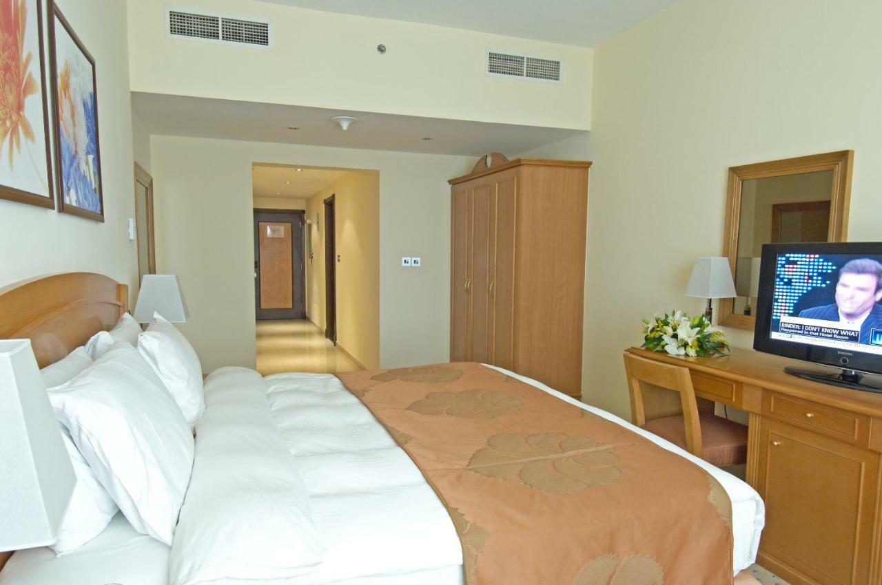 Golden Tulip Sharjah Aparthotel Eksteriør bilde