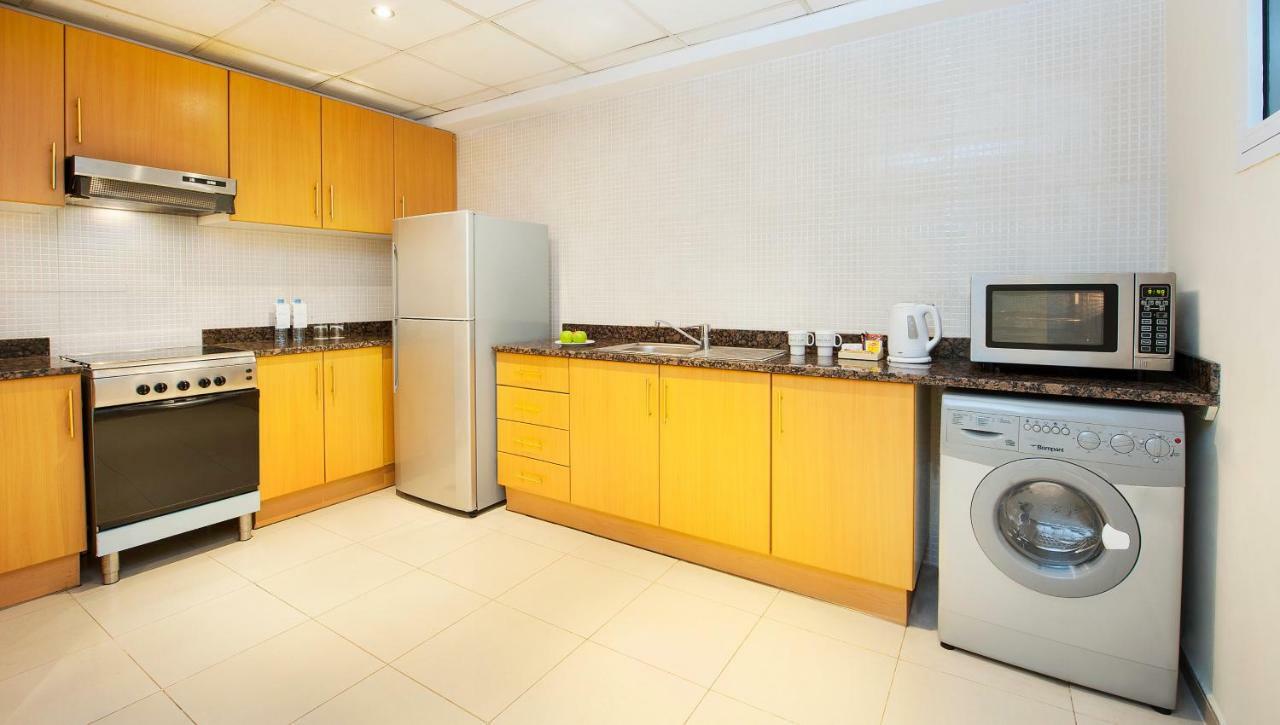 Golden Tulip Sharjah Aparthotel Eksteriør bilde